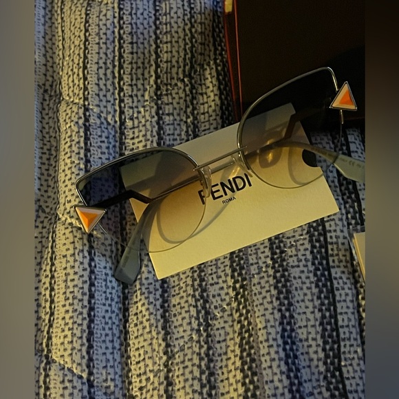 Fendi Black and Orange Rimless Eyewear